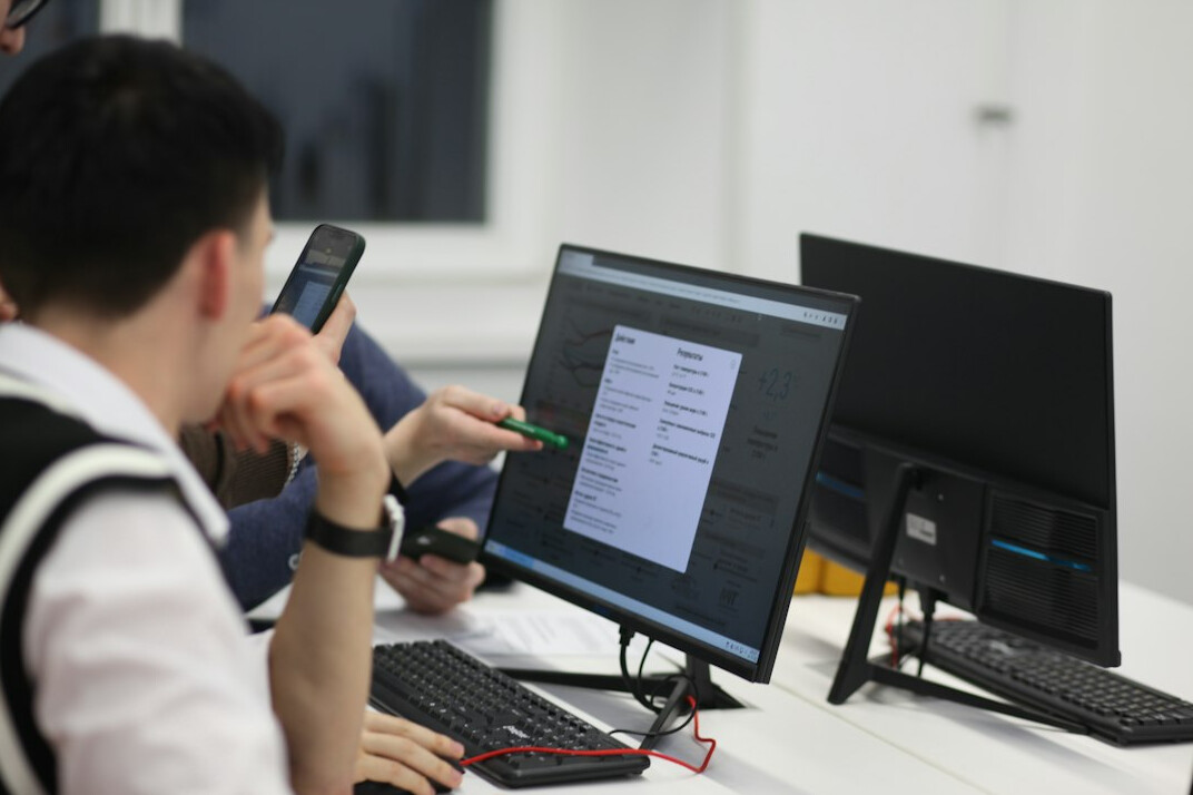 group of students learning coding